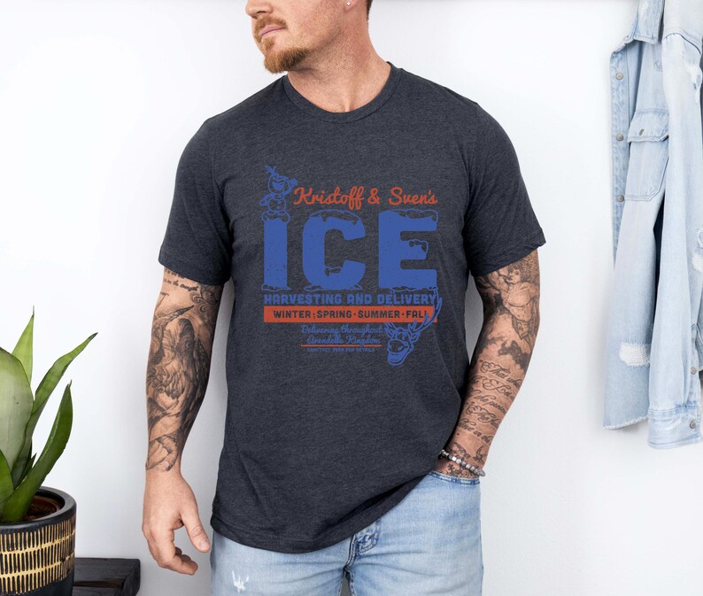 May include: Dark gray t-shirt with the text "Kristoff & Sven's ICE" in blue and orange. The shirt also includes the text "Harvesting and Delivery" and "Winter, Spring, Summer, Fall".