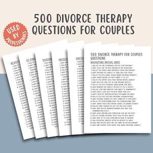 May include: A stack of printed cards titled "500 Divorce Therapy Questions for Couples." The cards are white with black text, and the cover has a red circle that says "Used by Professionals."