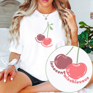 Innocent But Mischievous Cherry Tee Y2K Painted Coquette T-Shirt Cinnamon Girl Shirt Trendy Two Cherries Aesthetic Fruit Graphic Baby Tee