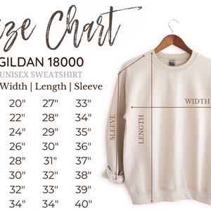 Peut inclure: Tableau des tailles pour un sweat-shirt unisexe Gildan 18000. Le tableau indique la largeur, la longueur et la longueur des manches en pouces pour les tailles S &agrave; 5XL.