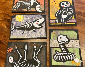 Five animal skeleton Halloween cards- shark, owl, snake, rhino, sloth