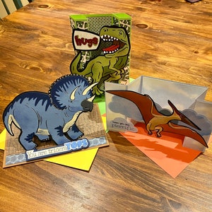 Trio of handmade pop  up dino cards- trex, triceratops, pterosaur