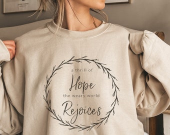 Sudadera navideña "Una emoción de esperanza": Belén cristiano