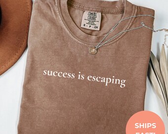Camiseta "El éxito es escapar": camiseta unisex inspiradora