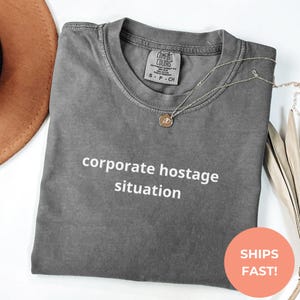 Corporate Hostage Situation T-Shirt: Dark Humor Office Tee