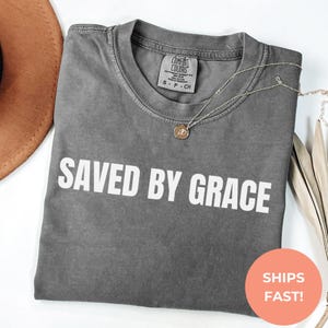 Comfort Colors® Saved By Grace Shirt | Christian Faith Tee | Bible Verse Inspiration Top | Positive Religious Graphic Shirt