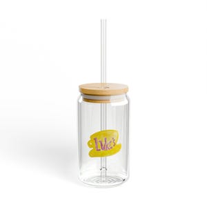 May include: A clear glass jar with a bamboo lid and a straw. The jar has a yellow and pink sticker with the text "Luke's" on it.