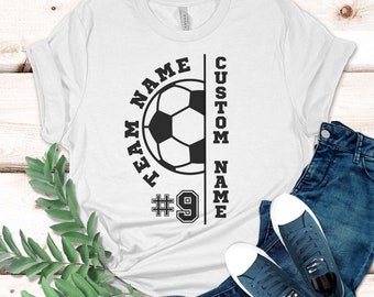 May include: White t-shirt with a black soccer ball graphic and the text "TEAM NAME #9 CUSTOM NAME" printed on it.