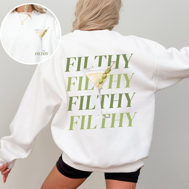 May include: White sweatshirt with the text "FILTHY" repeated four times in green text, with a martini glass and olive graphic in between each word.