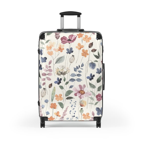 花柄スーツケース、女性用荷物、旅行用品、必須の荷物、旅行者への