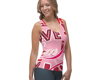 May include: A pink tank top with a colorful abstract design featuring the word "love" in a variety of fonts and colors.