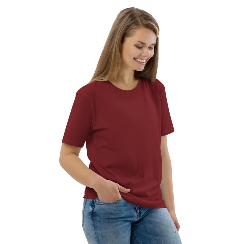 May include: A maroon short-sleeved t-shirt with a crew neck.