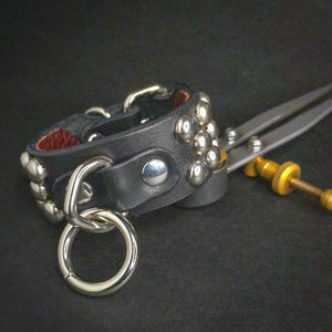 Dome studs leather bondage bracelet. Dome studded cuff