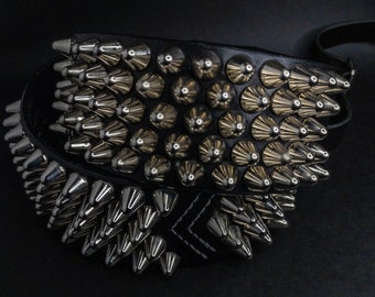 Handmade studded leather guitar strap. Heavy metal guitar strap with tall cone studs.