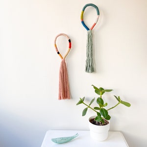 Set of 2 handmade knotted wall hangings, Pair of bohemian macrame fiber art pieces, Wrapped pastel rope wall decor set