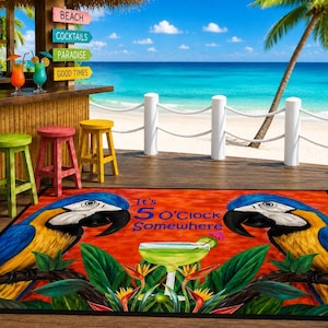 May include: A rectangular floor mat featuring two blue and yellow macaws facing each other on a vibrant orange background. Between the birds is a green cocktail glass and the text It's 5 O'clock Somewhere, surrounded by green tropical leaves.