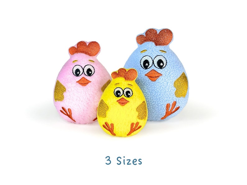 May include: Three plush toy chicks in different sizes. The largest chick is blue, the middle chick is yellow, and the smallest chick is pink.  The chicks have embroidered eyes, beaks, and feet.