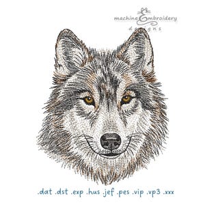 May include: A machine embroidery design featuring a detailed wolf head with brown, black, and white fur, amber eyes, and a black nose. The text machineEmbroidery designs appears at the top, and file formats .dat .dst .exp .hus .jef .pes .vip .vp3 .xxx are at the bottom.