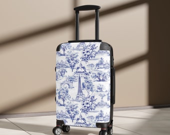 The Emily Parisian Toile Print Suitcase featuring the Eiffel Tower