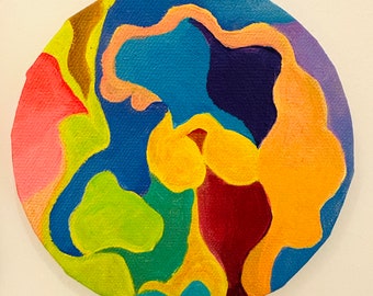 May include: Abstract painting on a round canvas with a variety of colors including blue, pink, yellow, green, and red. The colors are arranged in a swirling pattern.