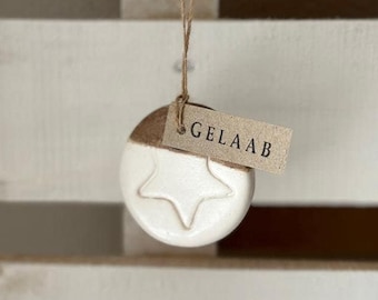 Handmade Ceramic Circle Ornament with Star Carving