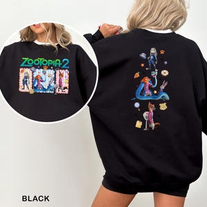 A black sweatshirt with a colorful graphic of cartoon characters from the movie Zootopia on the back.