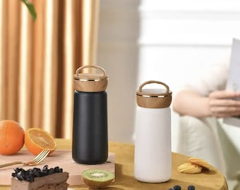 Vacuum Insulated Water Bottle: Stainless Steel with Bamboo Cup (330 ml)