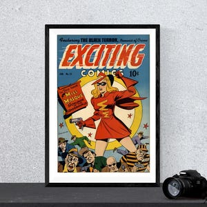 May include: Framed vintage comic book cover titled "Exciting Comics" featuring a female superhero in a red outfit, holding a gun. The cover art includes the text "Miss Masque" and a price of 10 cents. The background is blue with a yellow sunburst.