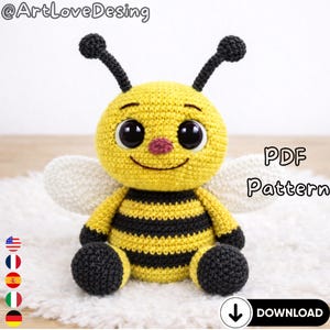 May include: A crocheted bee plushie with a yellow body and black stripes. The bee has large, black eyes, a pink nose, and white wings. The image includes the text "PDF Pattern" and a download icon.