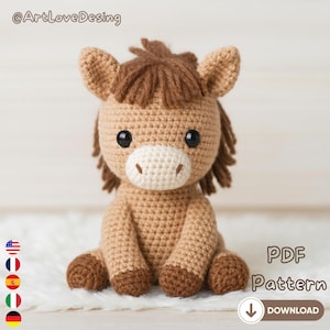 May include: A crocheted horse doll in shades of tan and brown, with a white muzzle and dark eyes. The doll has a brown mane and is sitting on a white surface. The image includes the text "PDF Pattern" and a download arrow.