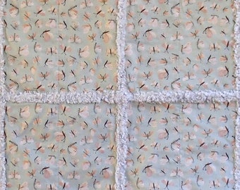 Free Australia wide shipping. Butterfly rag quilt on sage green back ground.