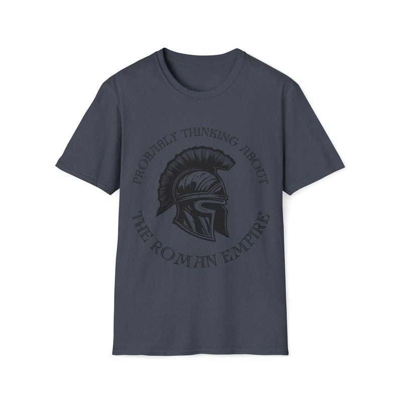 May include: A dark blue t-shirt with a black graphic of a Roman helmet and the text "Probably thinking about the Roman Empire".