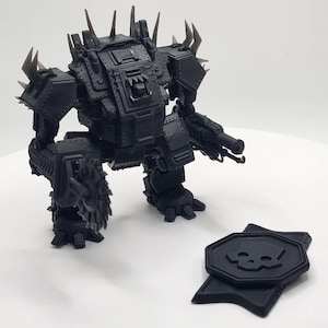 May include: A black, articulated, mechanical robot with a saw blade on one arm and a gun on the other. The robot has spikes and a skull symbol on its chest.