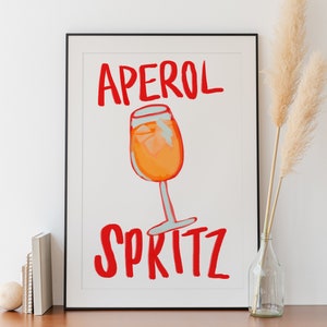Aperol Spritz print poster barwagen accessoires funky cocktail muur kunst eclectische unieke Italiaanse drankje decor maximalistische keukenbar schilderij