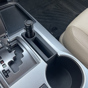 2014+ 4Runner mittkonsol förvaring av telefon/ficklampa