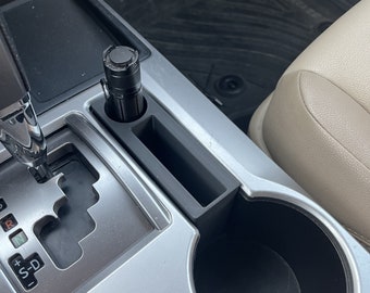 2014+ 4Runner Konsola środkowa Schowek na telefon/latarkę