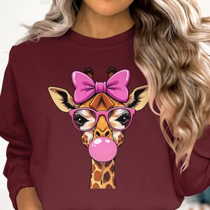 Funny Giraffe with Pink Glasses and Bow T-Shirt and Sweatshirt Fun Cartoon Animal Tee Cute Bubblegum Design Cool Gift