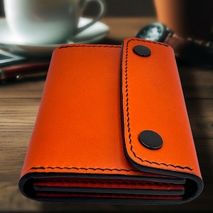Cartera triple para hombre en color naranja y negro: tarjetero fino de piel cosido a mano para Halloween, cierre a presión e interior de gamuza