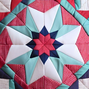 Könnte beinhalten: Ein Quiltblock mit einem Sternmuster in Rot, Weiß und Blau. Der Stern besteht aus kleineren Sternen und ist von einem karierten Muster umgeben.