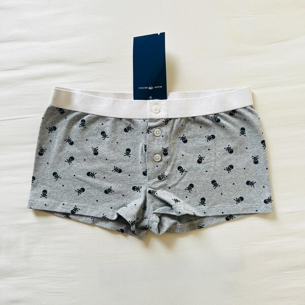 BNWT Brandy Melville/John Galt white and light gray button boy shorts with black skulls and mini stars graphic design