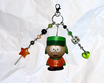 Llavero colgante plateado para bolso de Kyle, Kenny, Cartman y Stan Butters de South Park *Leer descripción*