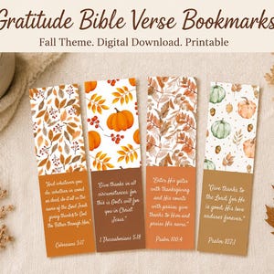 May include: Four rectangular bookmarks featuring fall-themed illustrations of orange pumpkins, autumn leaves, and berries. Each bookmark displays a unique Bible verse in white script text over solid orange, brown, or tan colored backgrounds.