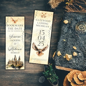 May include: Two bookmark style wedding invitations with a Harry Potter theme. The first bookmark features a watercolor illustration of Hogwarts castle and the text "Bookmark the Date for the Wedding of Simone Jackson & Melanie Rebelo". The second bookmark features an owl illustration and the text "Gatewood Lansing Michigan 15 04 25".