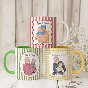 May include: Three ceramic mugs featuring custom illustrations of adults holding infants. The top mug has red stripes and text reading Ryan & James. The bottom left mug has green stripes and text reading John & Gary. The bottom right mug has yellow checks and text reading Scout & Grandpa.