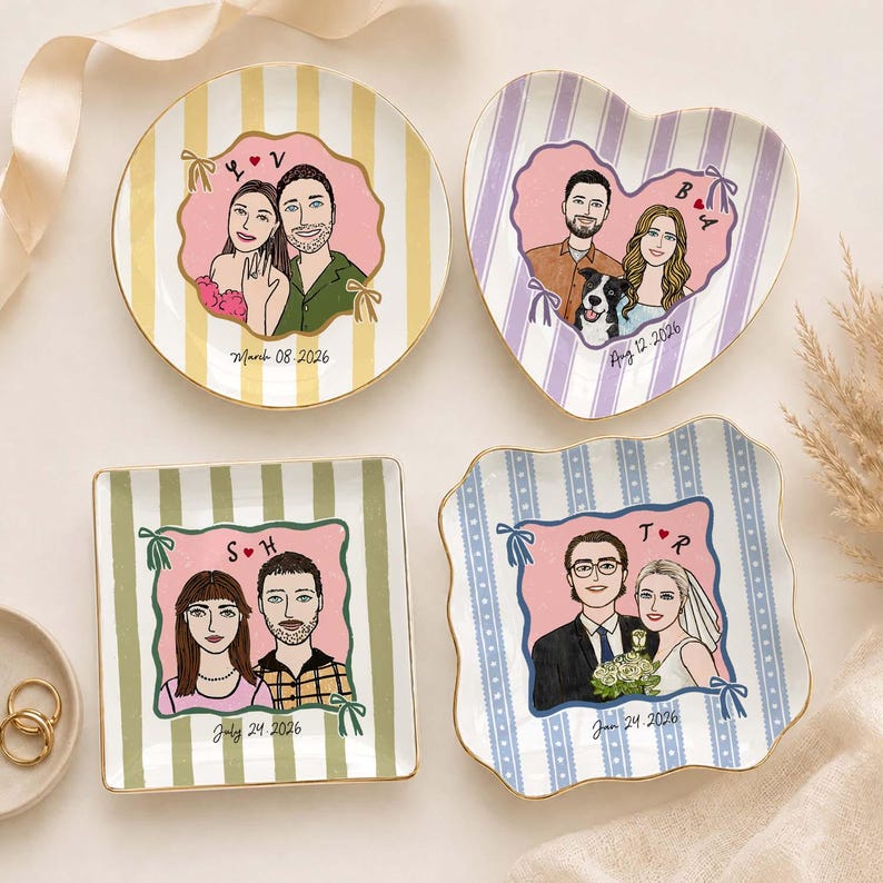 May include: Four ceramic trinket dishes with gold rims, each featuring a custom illustration of a couple. The round dish has yellow stripes, the heart-shaped dish has purple stripes, the square dish has green stripes, and the wavy dish has blue stripes.