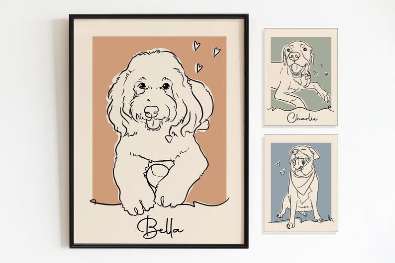 May include: Three framed line drawings of dogs. The first drawing is of a dog named Bella with a brown background. The second drawing is of a dog named Charlie with a green background. The third drawing is of a dog with a blue background.
