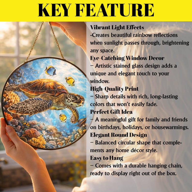 May include: Round stained glass window art featuring a sea turtle and fish. The artwork has a vibrant, colorful design with a hanging chain. The text "KEY FEATURE" is at the top.