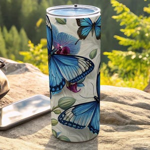 Blauwe vlinderbeker: bloemenorchideeontwerp, roestvrij staal 20oz