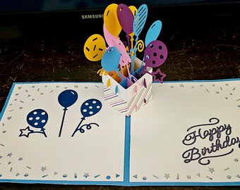Tarjeta de cumpleaños con globo emergente