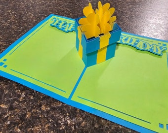 Pop up present birthday card.